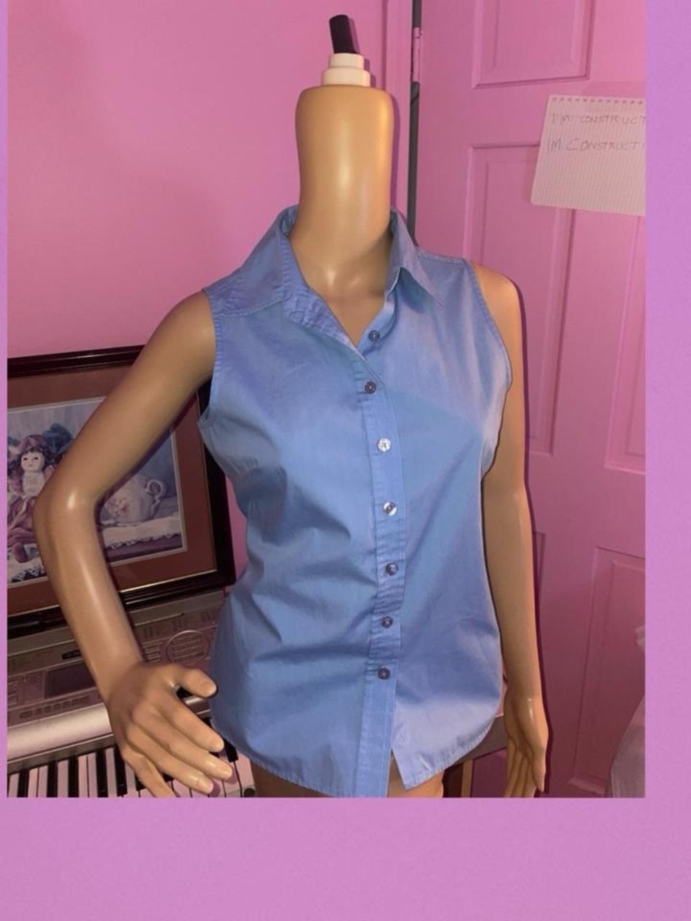 blue button down sleeveless top